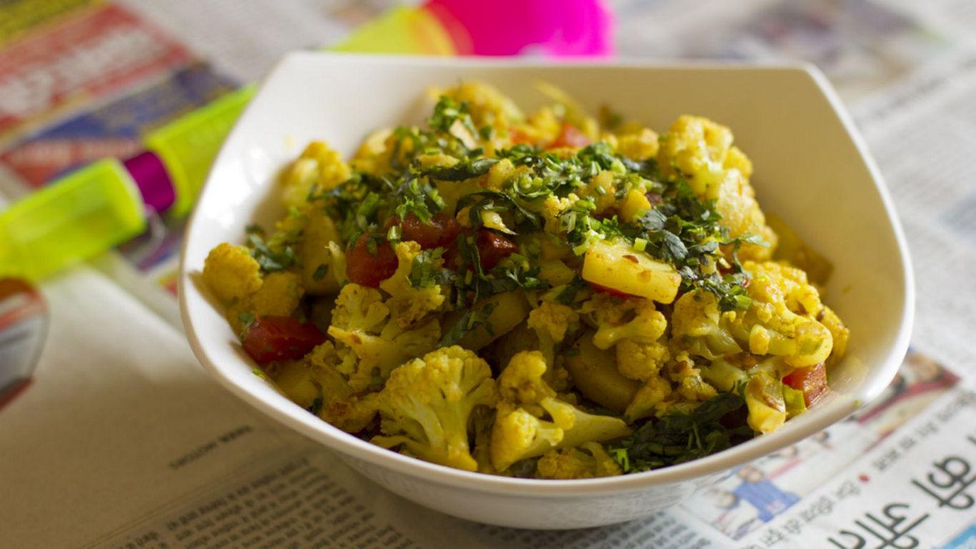 Spiced cauliflower dish with vibrant garnish