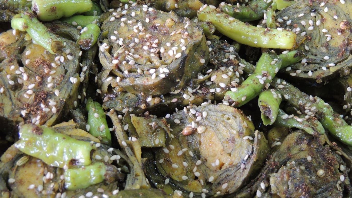 Spiced artichokes with green chilies and sesame