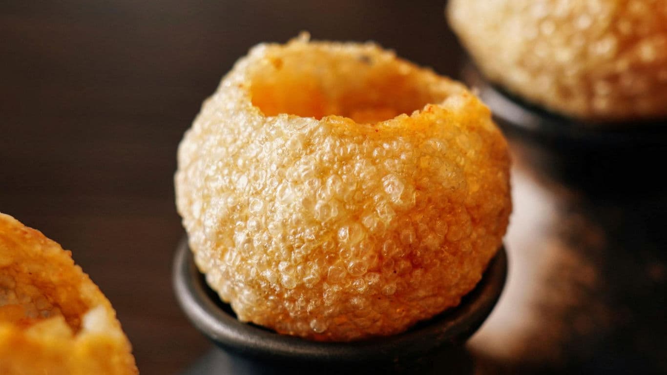Close-up of crispy Indian pani puri shell