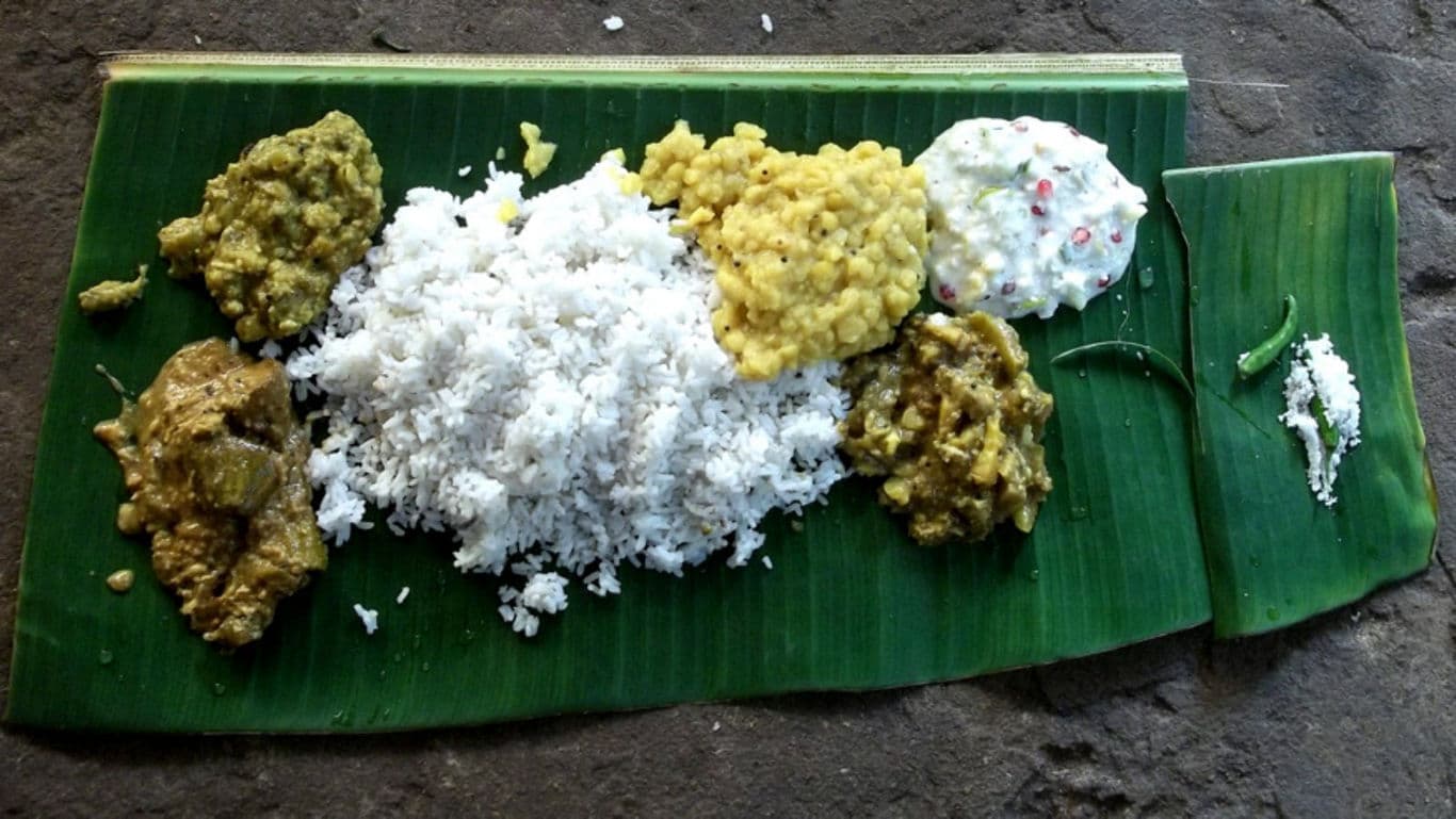 Traditional Indian meal on banana leaf