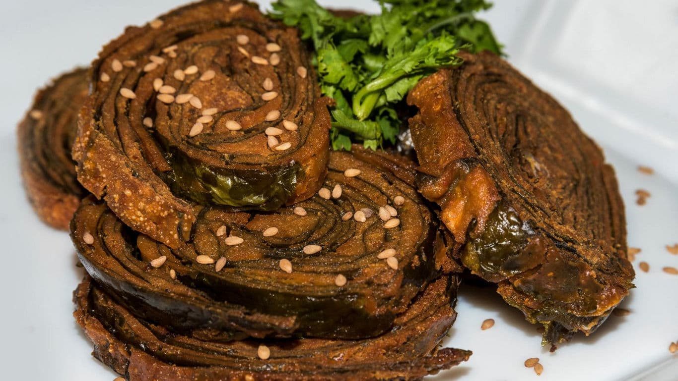 Close-up of crispy spiral fried snack