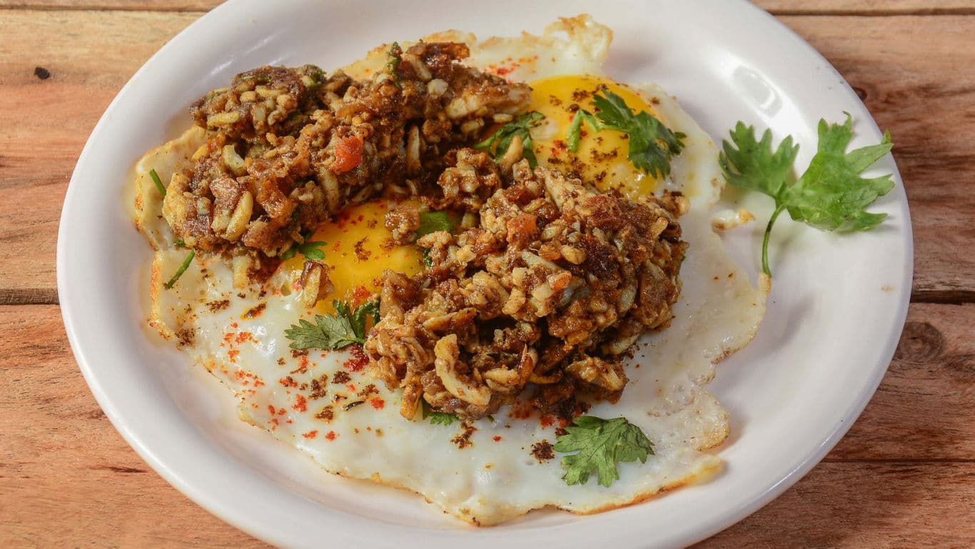 Fried Eggs Topped With Spiced Minced Meat
