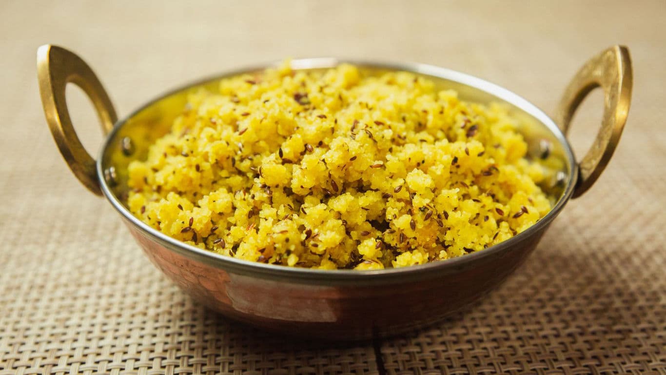 Traditional Indian Upma Served in Brass Bowl