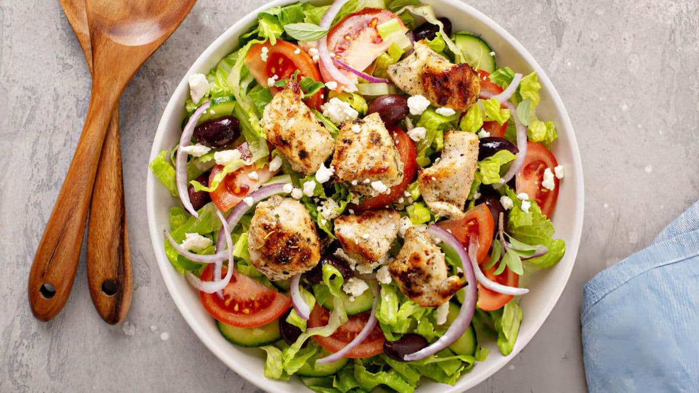 Fresh Greek salad with grilled chicken