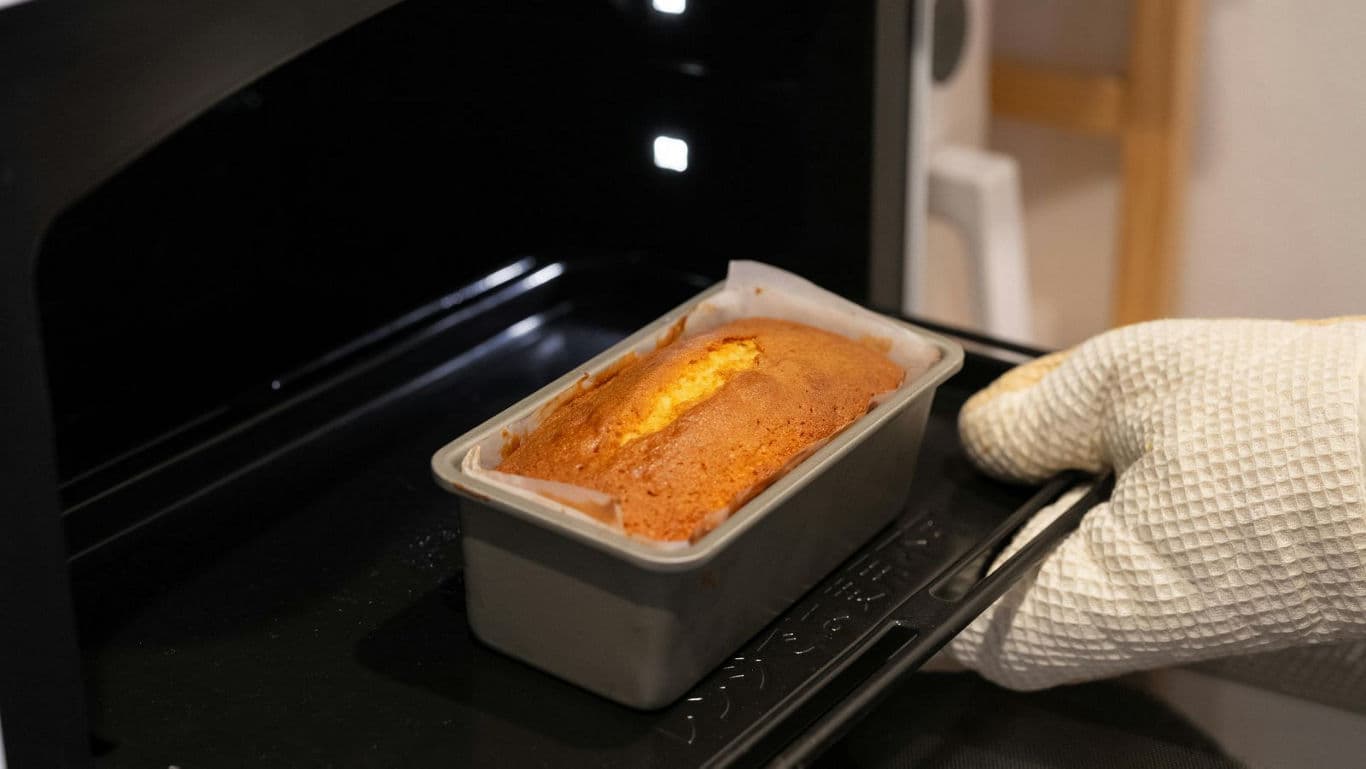 Troubleshooting why a cake sinks in the middle during baking. 