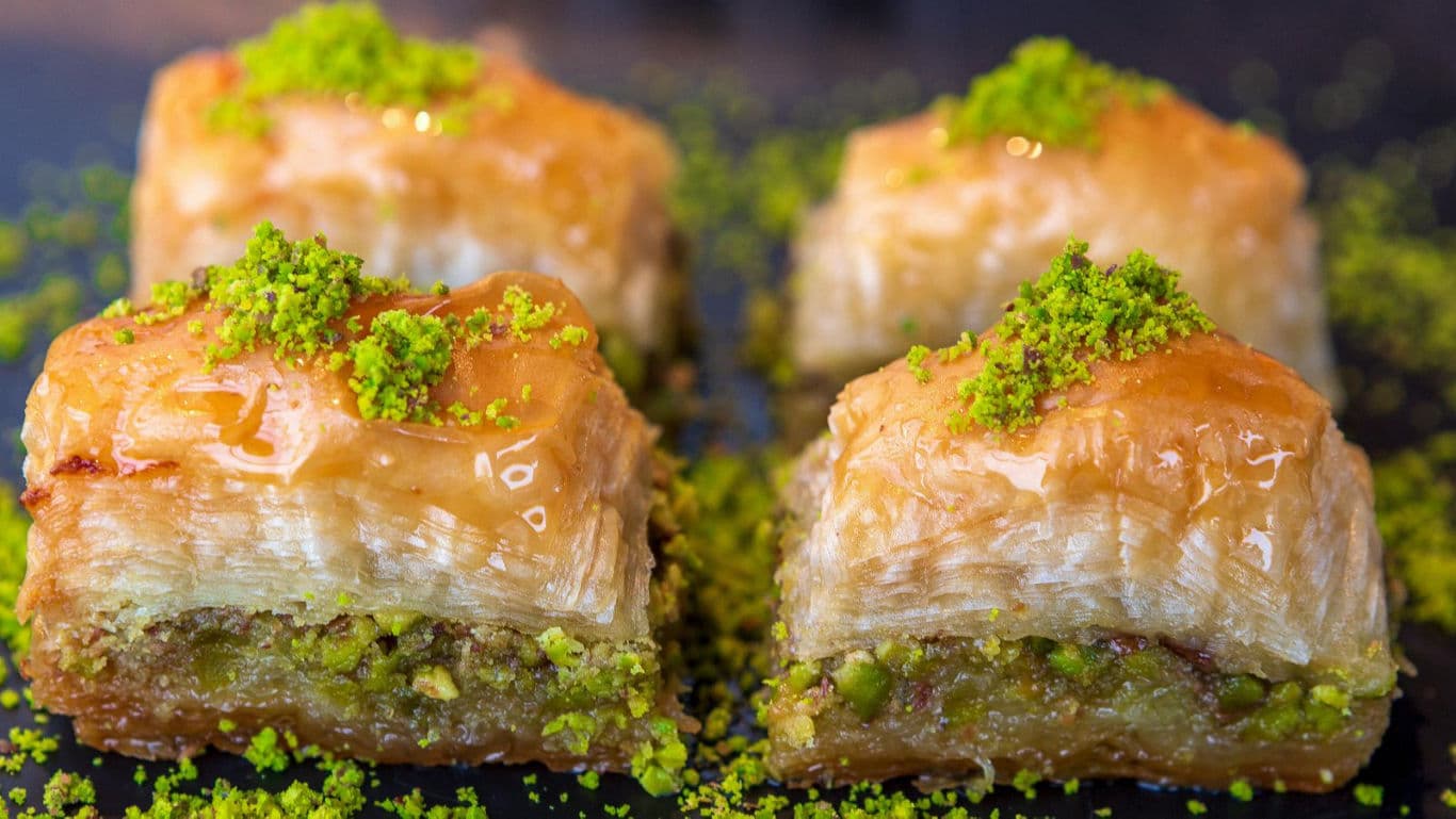 Close-up of Pistachio Baklava Pieces with Syrup