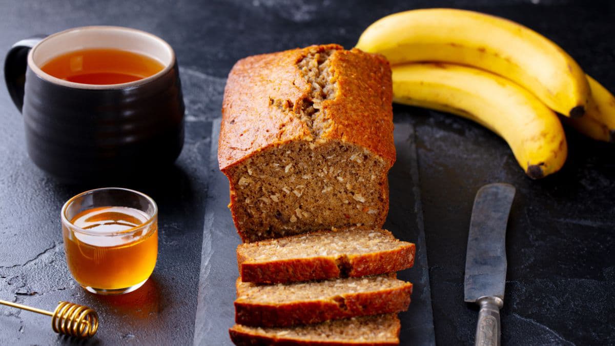 Bananas, sliced bread, and a teacup