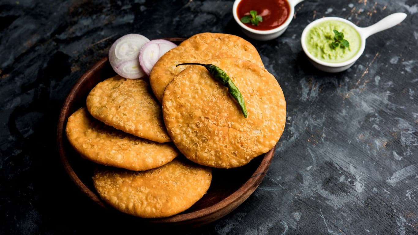 Indian fried kachori snack with chutneys