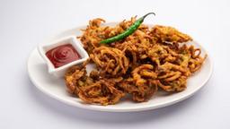 Crispy Onion Pakora Recipe: Perfect Tea-Time Snack In Minutes
