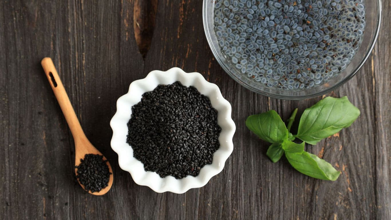 Basil seeds in bowl and spoon