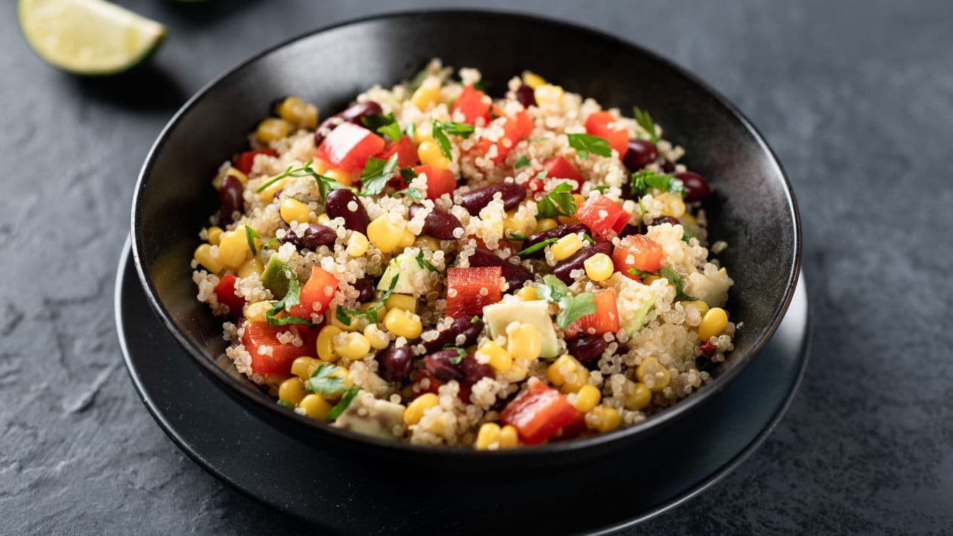 Colorful Quinoa Salad with Corn and Beans in Bowl