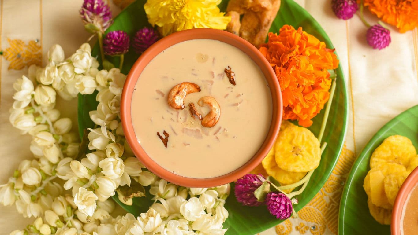 Traditional Indian dessert payasam with festive flowers