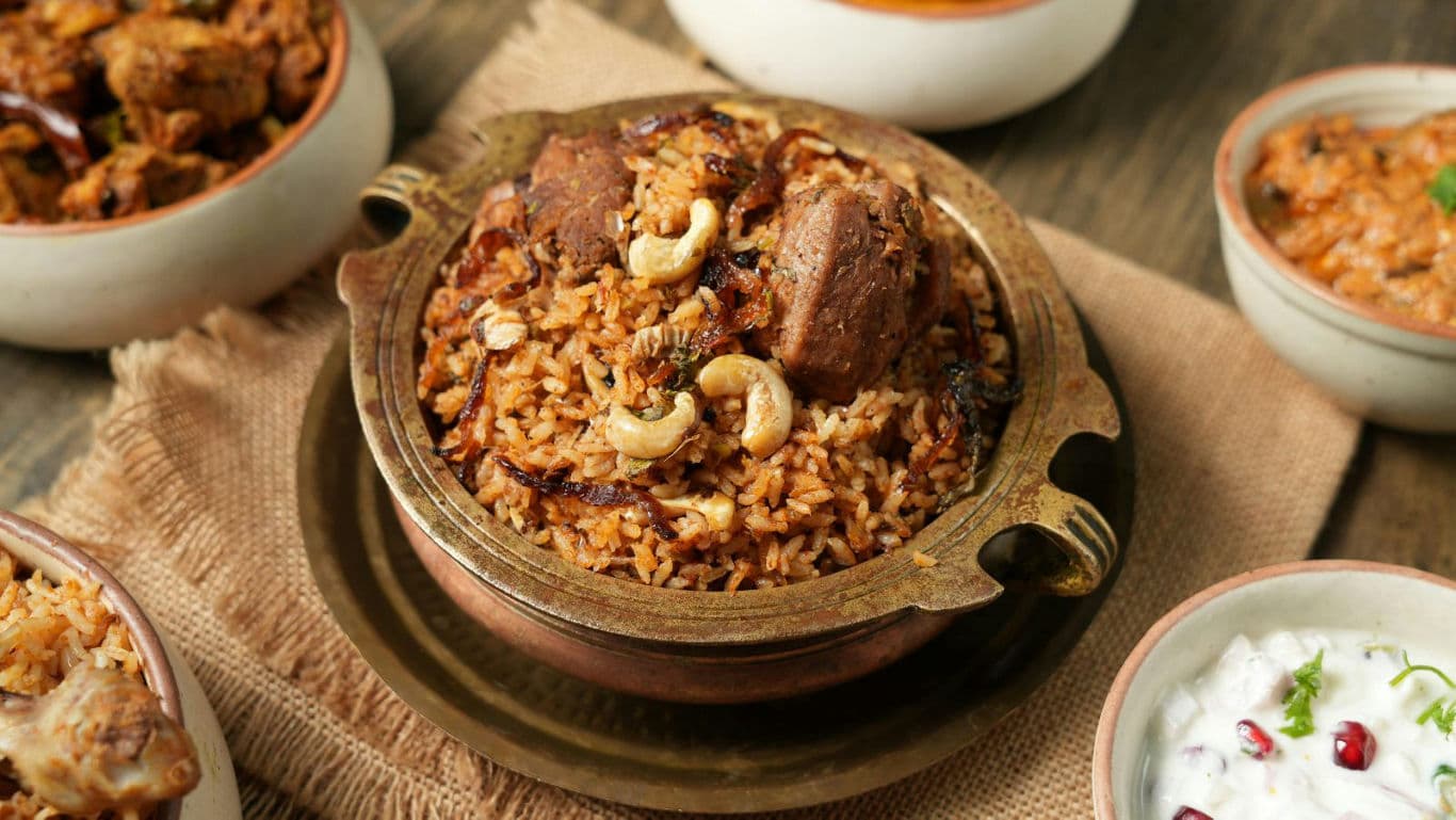 Traditional biryani served in rustic bowls
