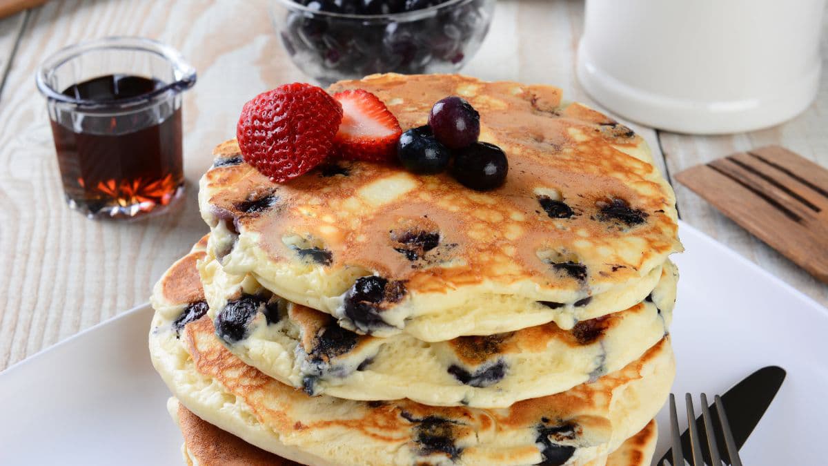 blueberry pancakes with strawberry on top