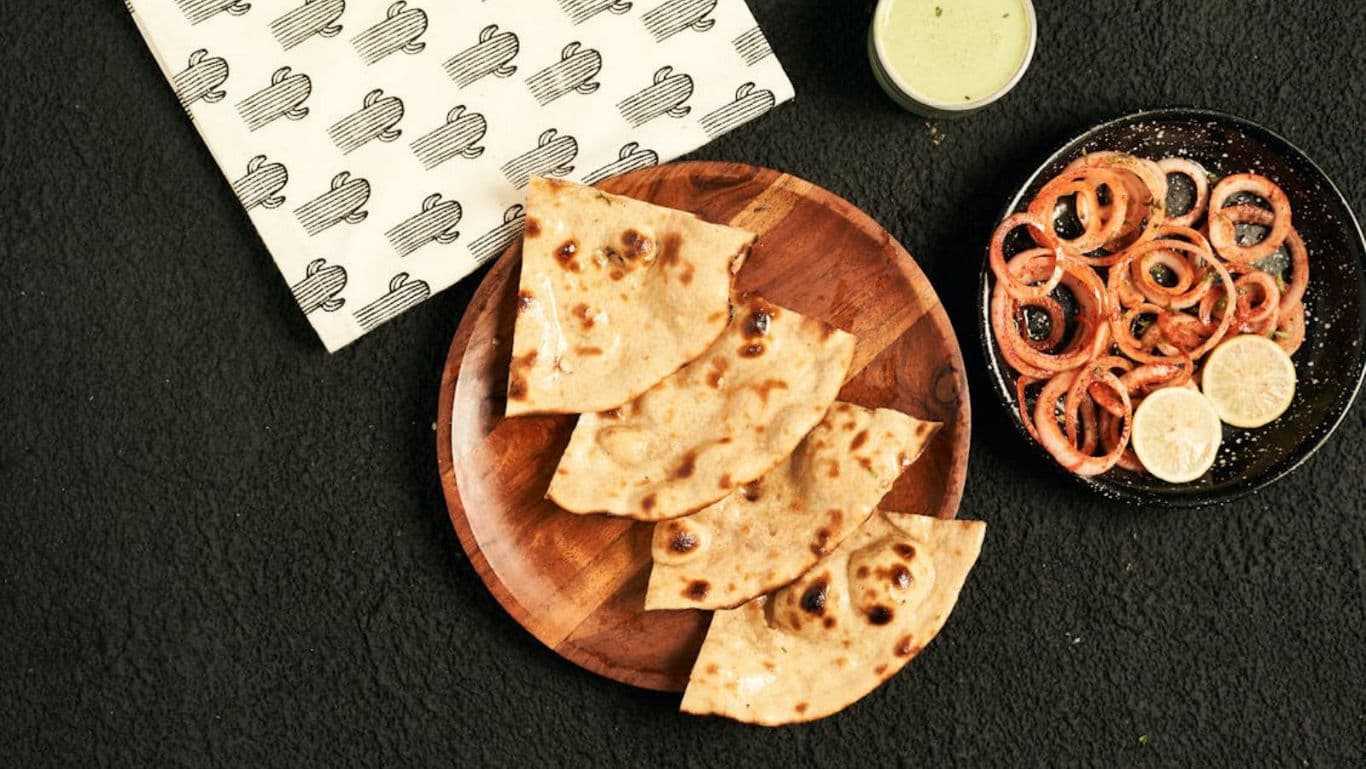 Flatbread with salad and dipping sauce