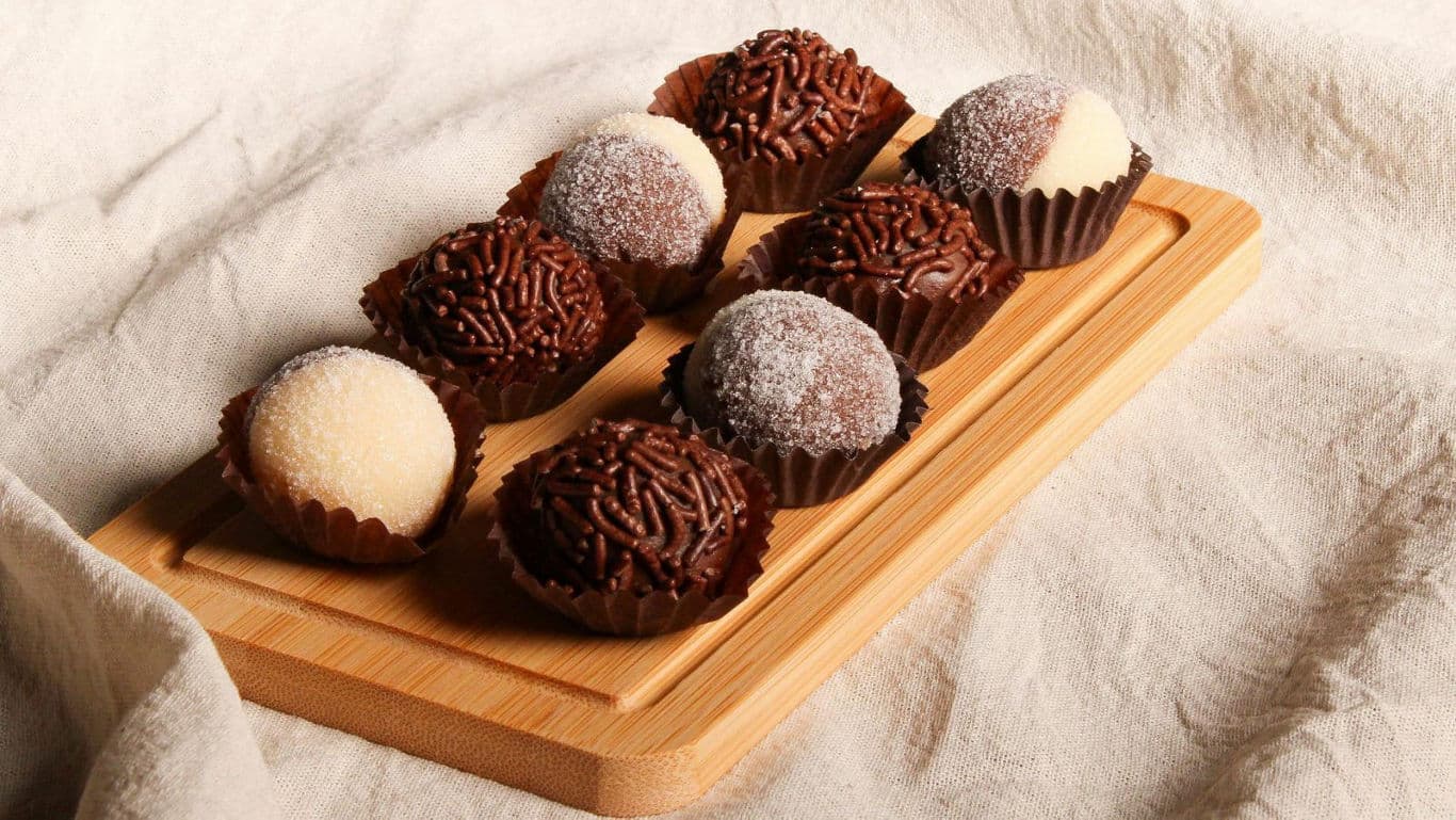 Assorted Chocolate and Coconut Truffles on Wooden Tray