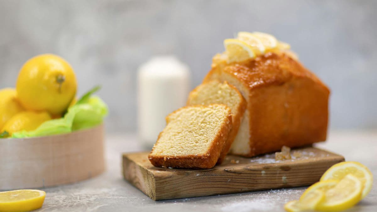 lemon loaf cake on a wooden tray