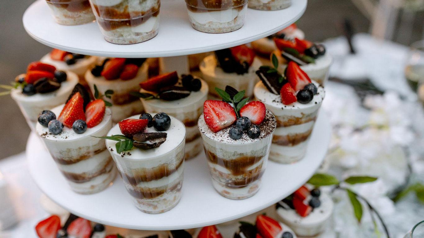 Tiered dessert cups with fresh berries
