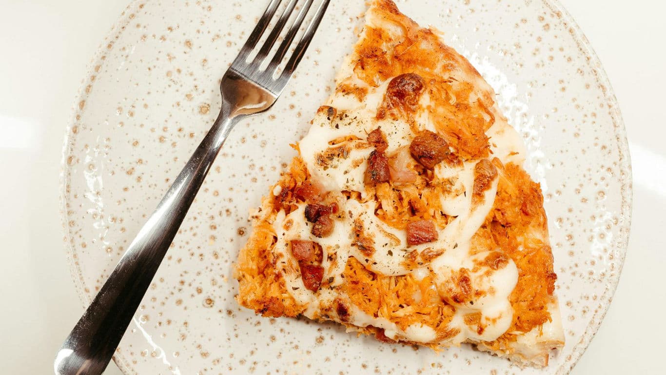 Single slice of gourmet chicken pizza