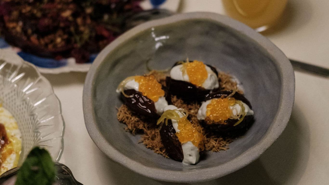 Gourmet stuffed dates with creamy topping
