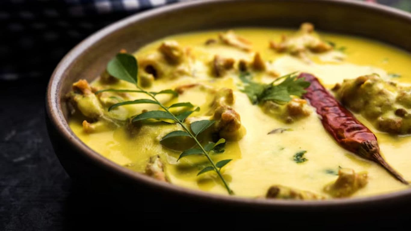 Traditional Indian Kadhi with Pakora and Spices