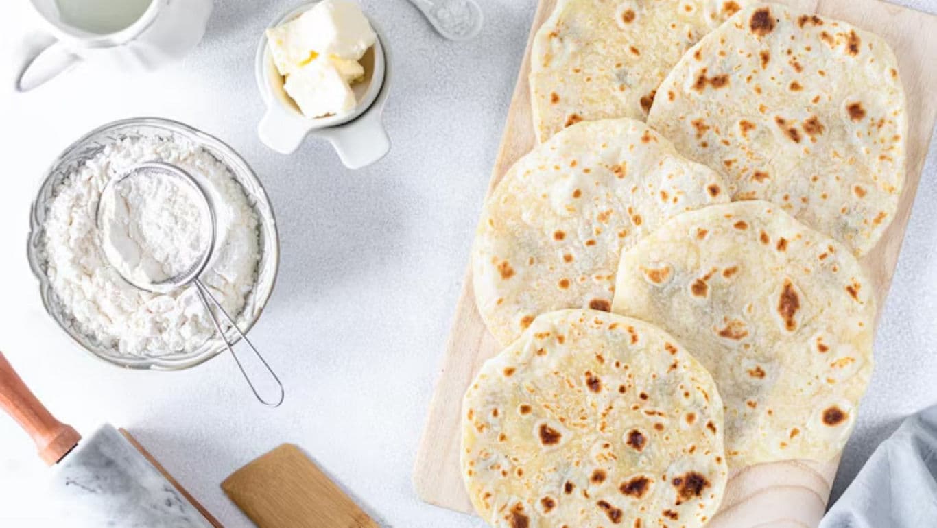 Homemade flatbreads with baking ingredients