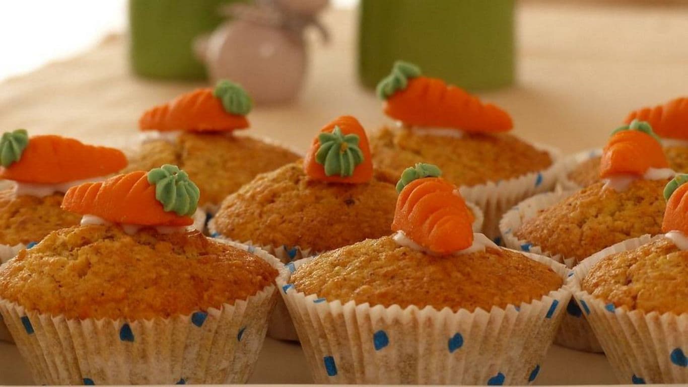 Carrot Muffins with Decorative Icing Carrots on Top
