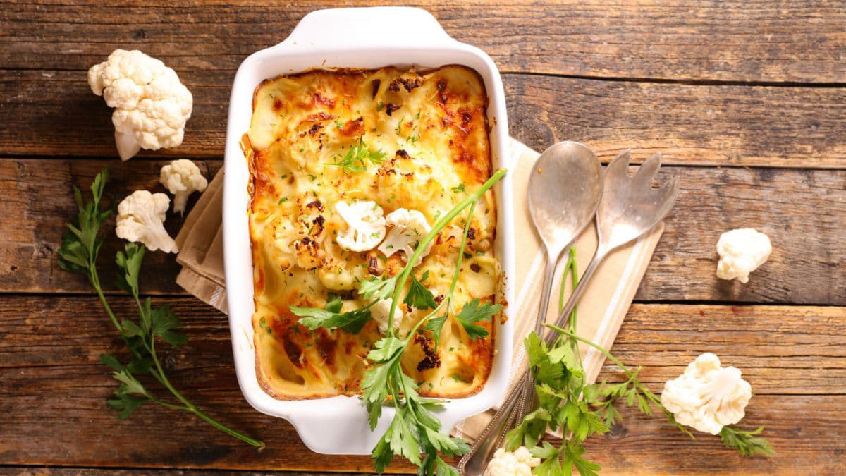 Cauliflower Gratin on a table with florets