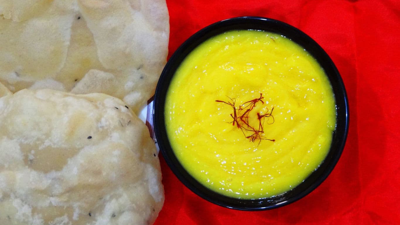 Traditional Indian dessert shrikhand with puri