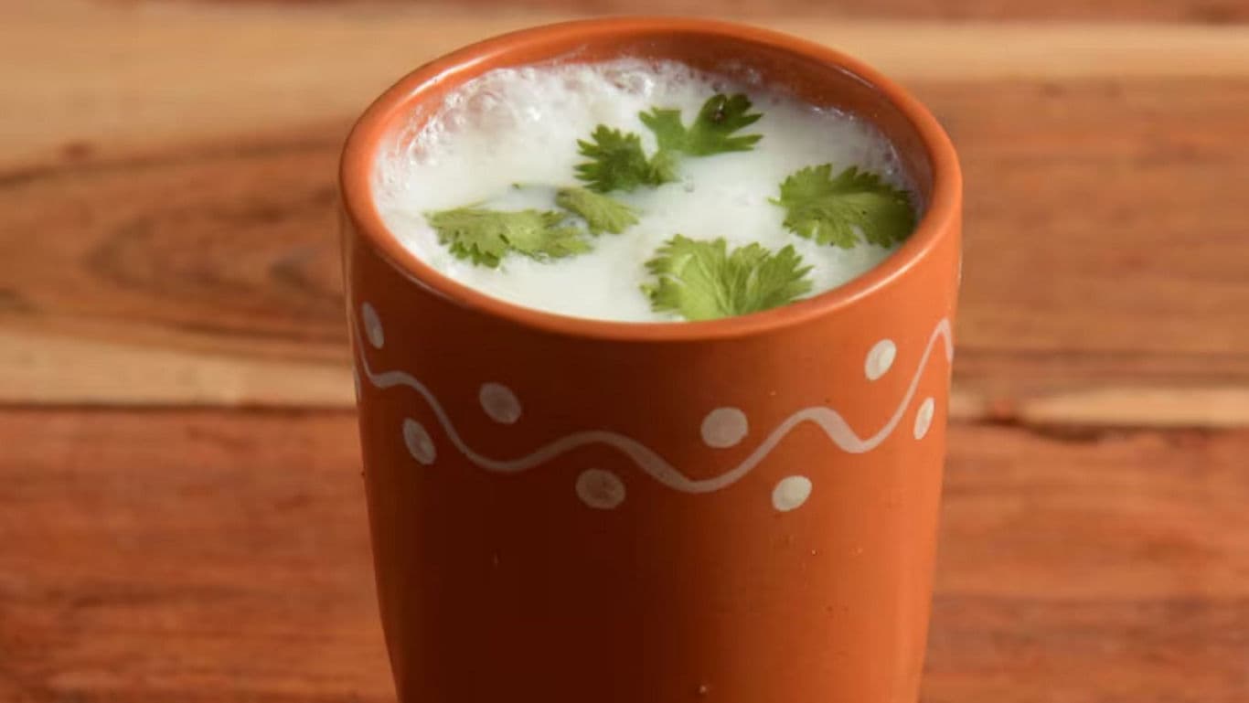 Traditional clay cup filled with spiced buttermilk