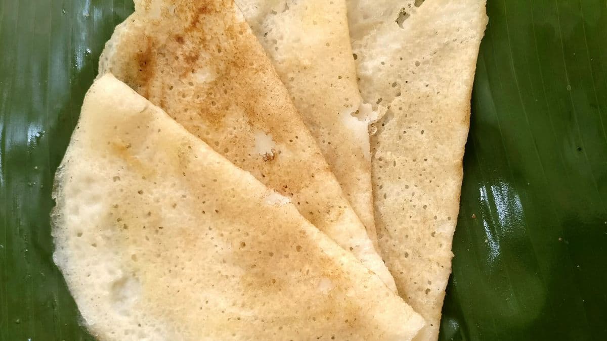 chakuli pitha on banana leaf
