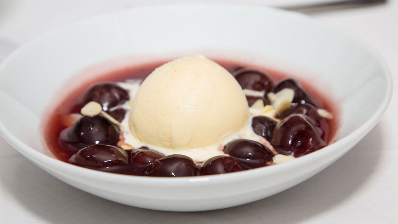 Vanilla ice cream with cherries dessert