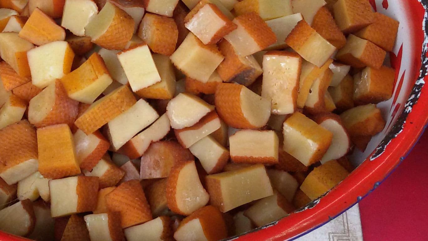 Cubed Smoked Cheese in Red Rimmed Bowl