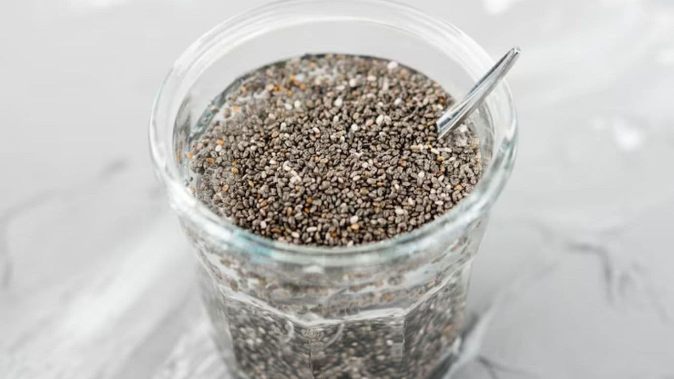 Glass Jar of Chia Seeds with Spoon