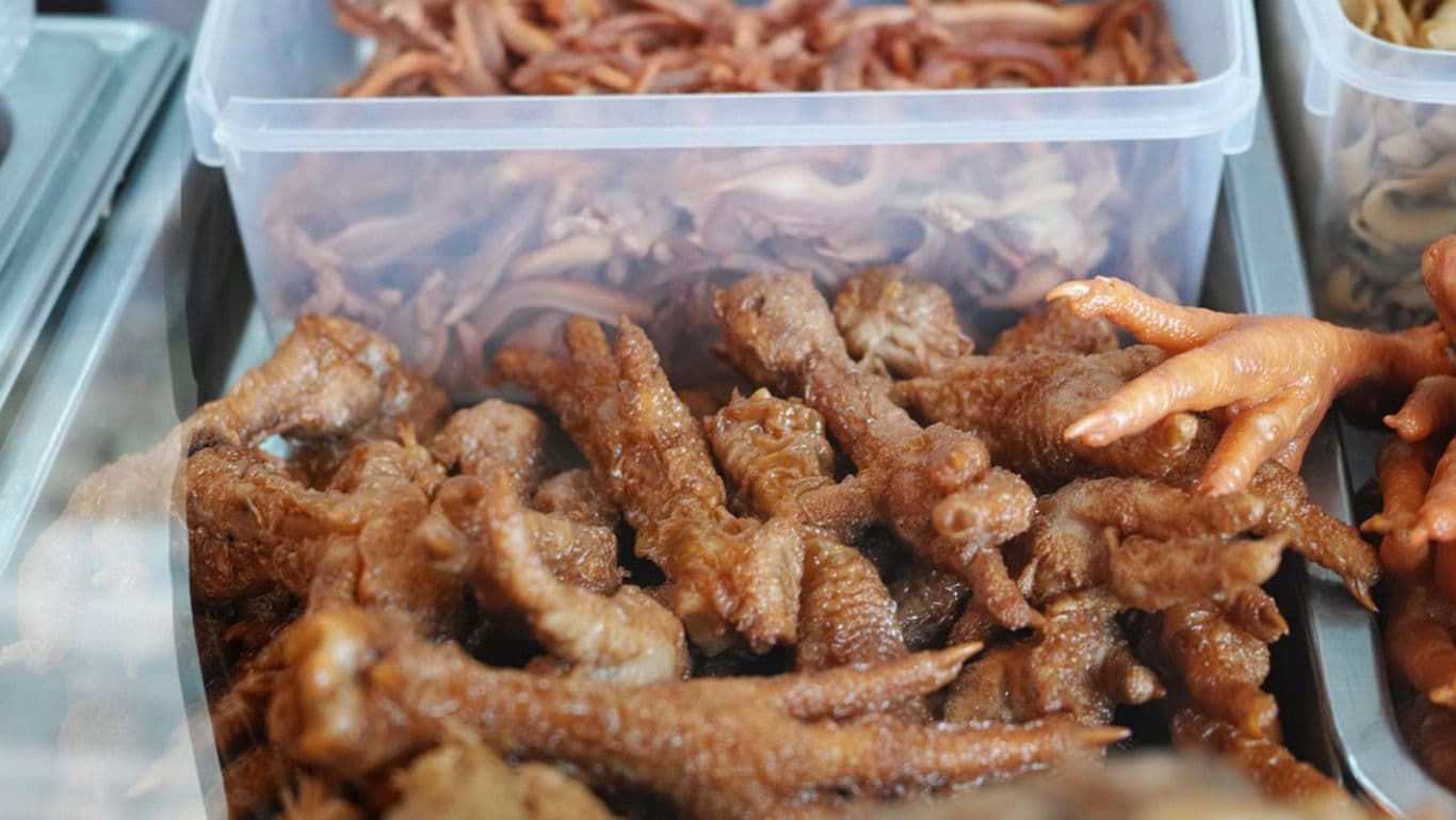 Cooked Chicken Feet and Meat in Market Display
