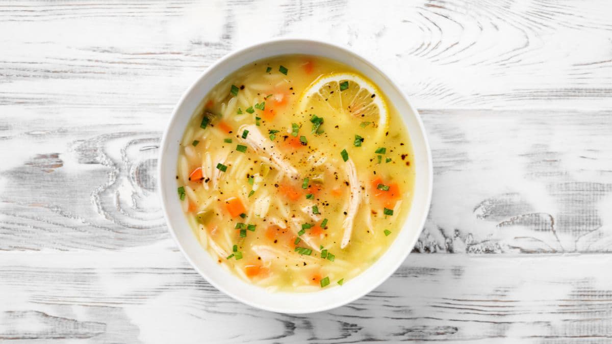 a bowl of chicken lemon soup