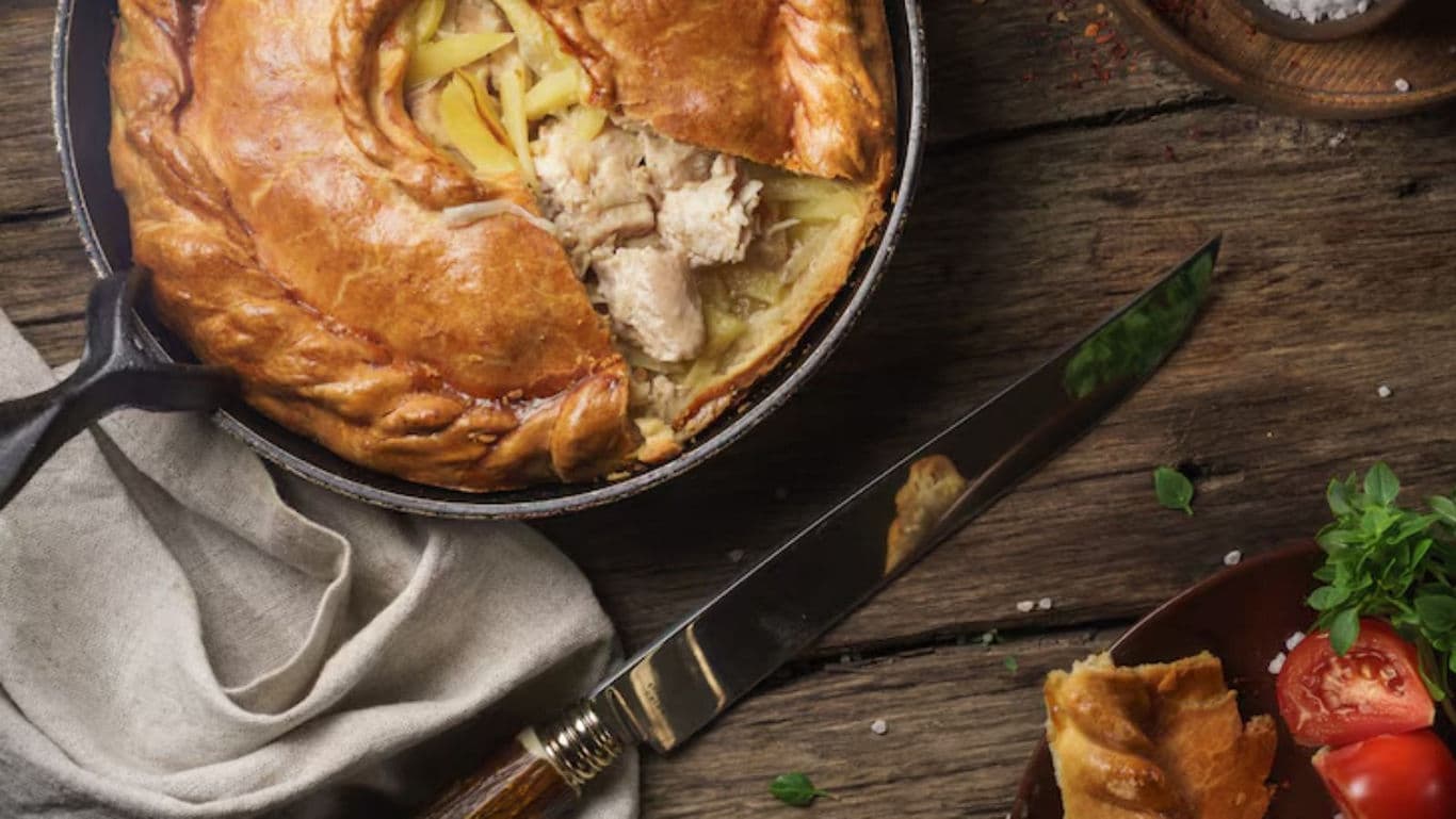 Homemade Chicken Pot Pie on Rustic Wooden Table