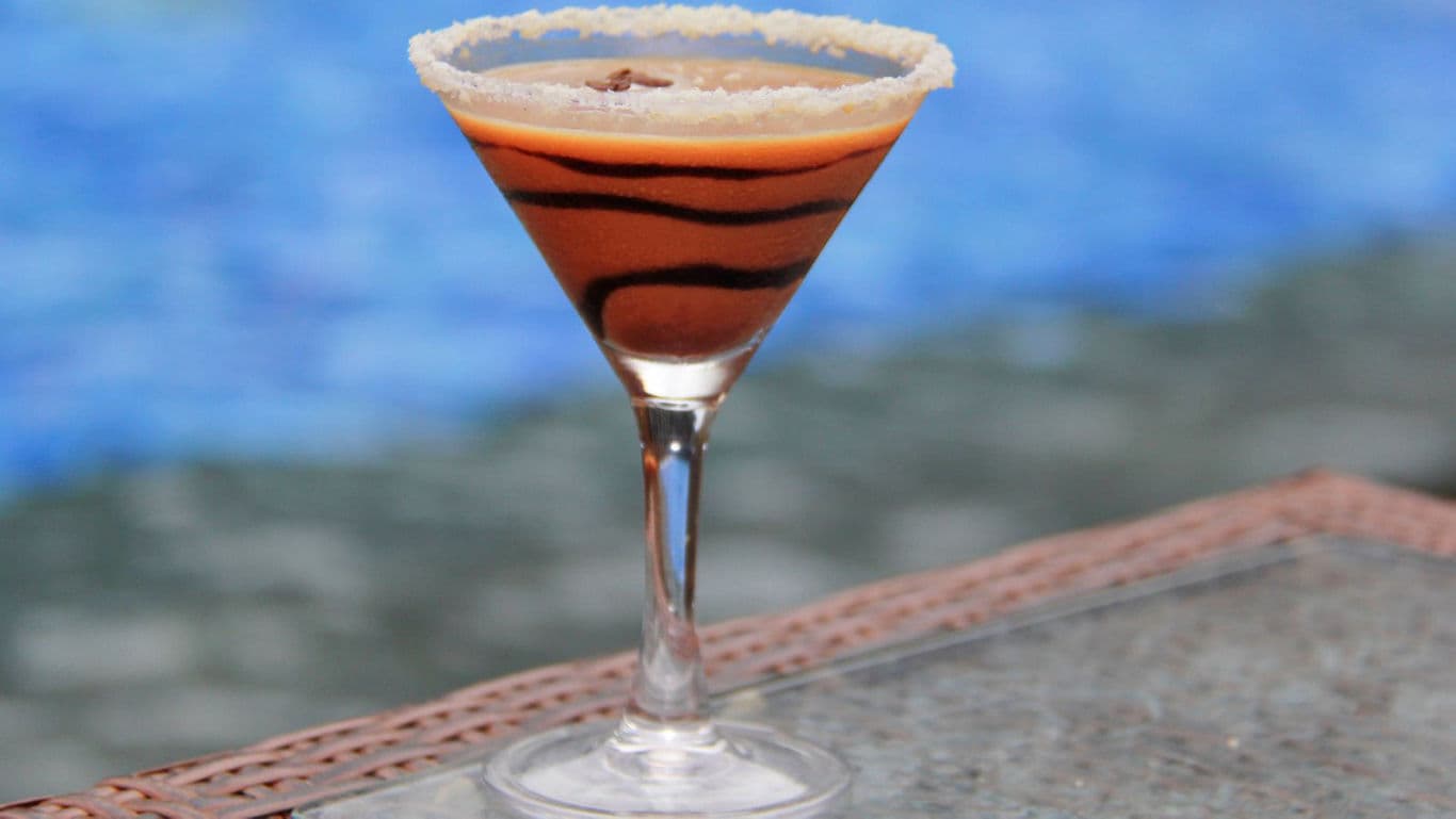 Chocolate martini cocktail by swimming pool