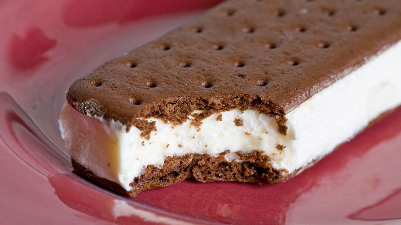 Partially eaten vanilla ice cream sandwich