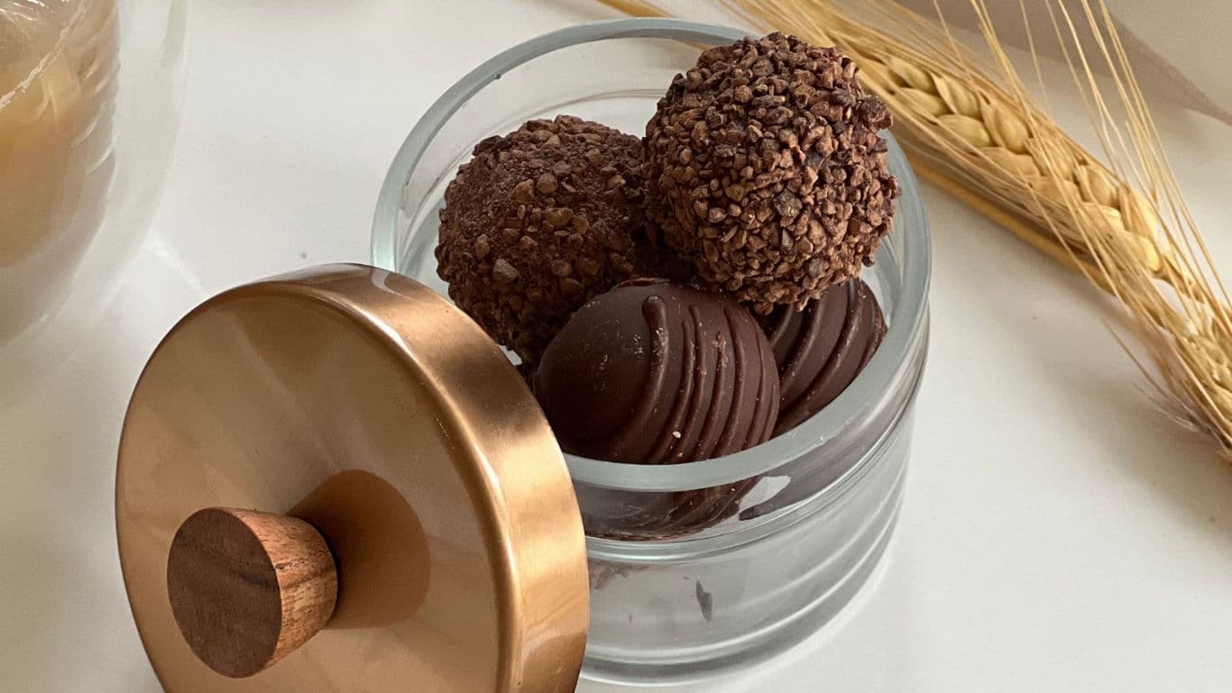Glass jar of assorted chocolate truffles