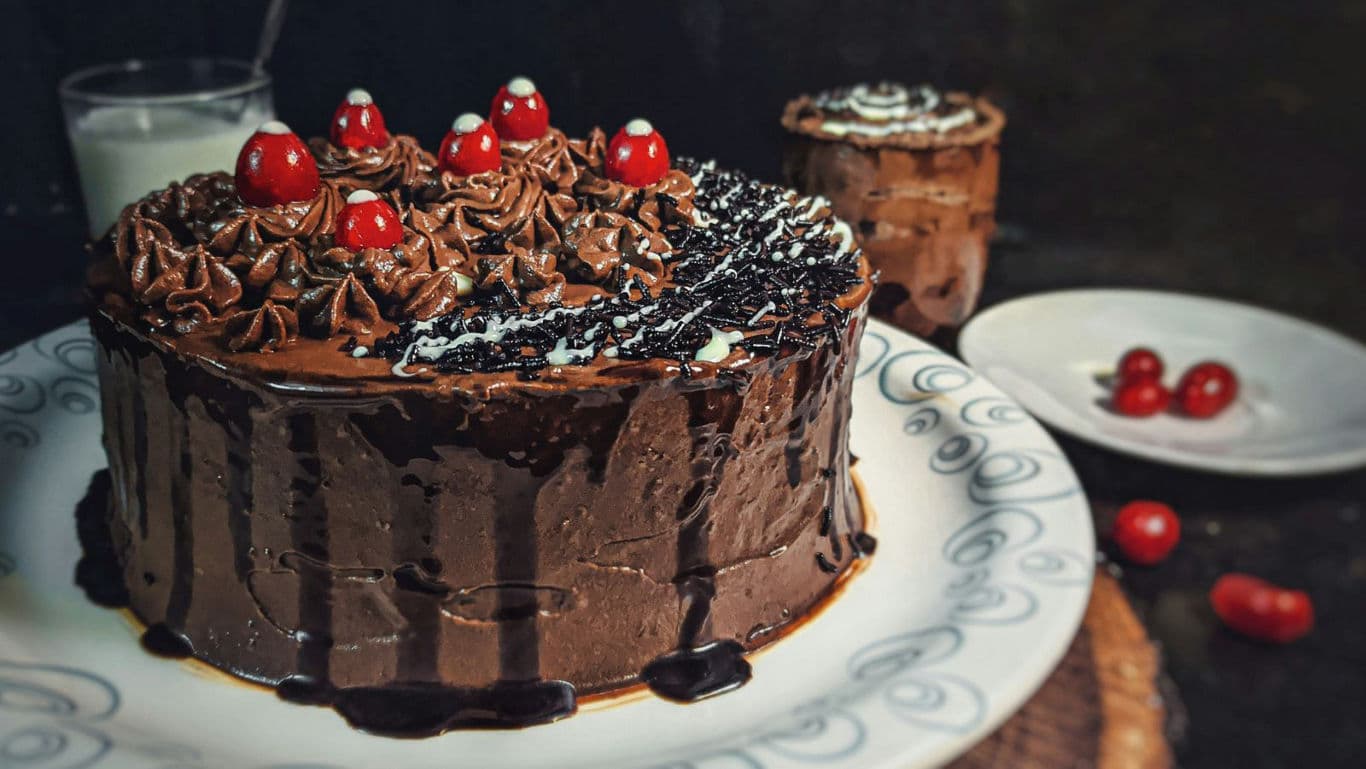 Rich chocolate cake with cherries dessert