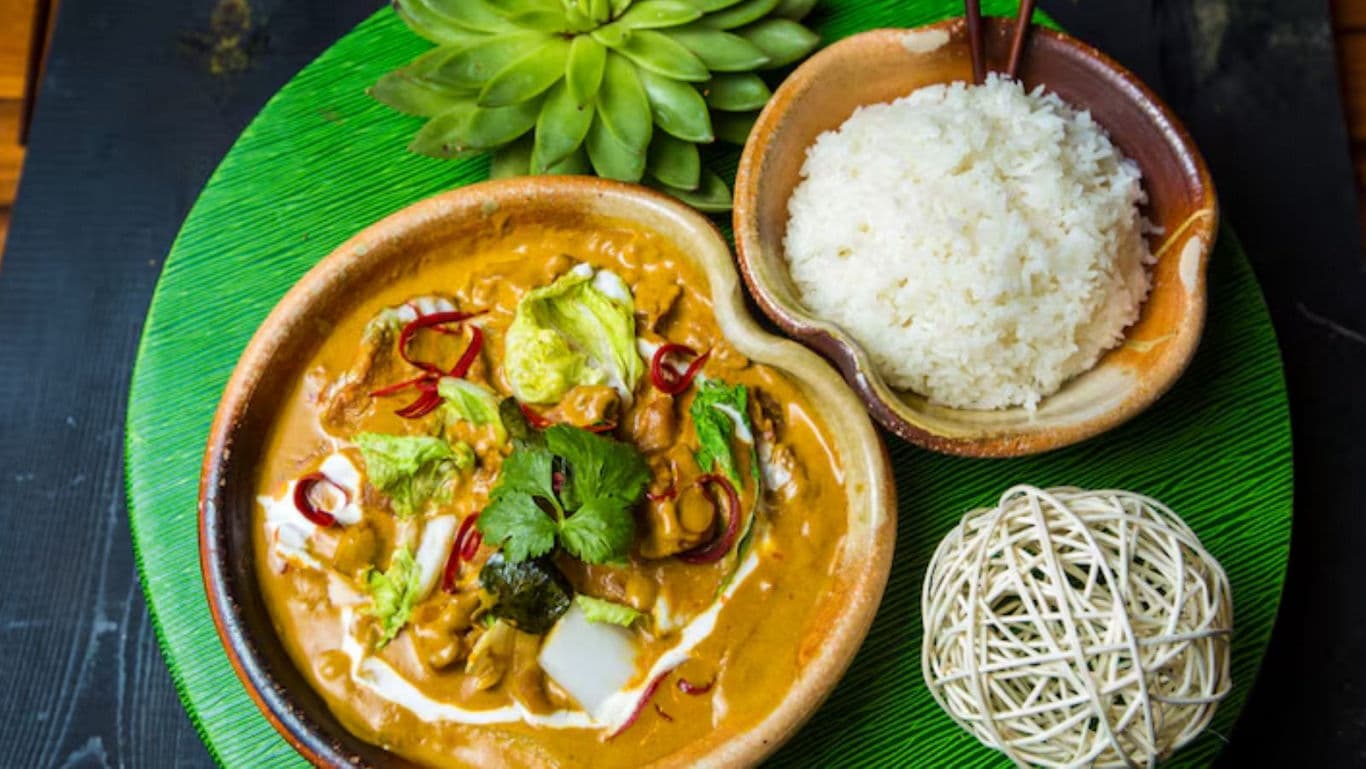 Thai curry with rice and garnish