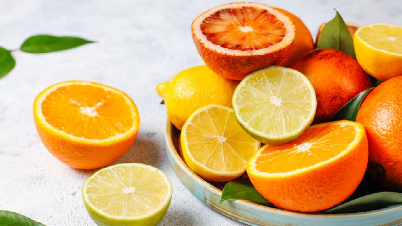 Fresh Citrus Fruits on Ceramic Plate