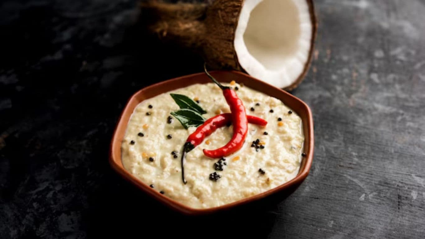 Coconut chutney with red chilies in bowl