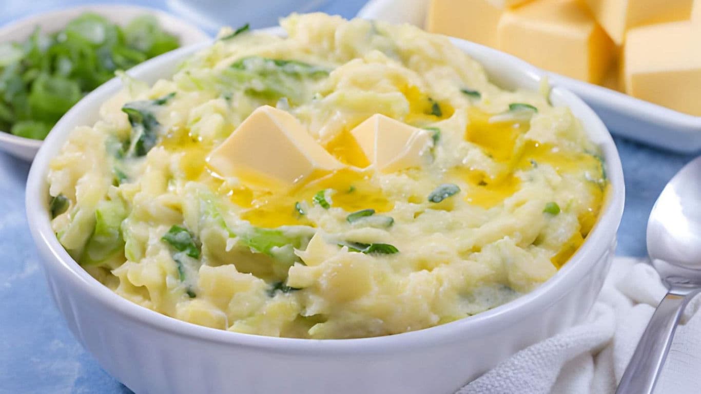 Creamy mashed potatoes with butter and green onions