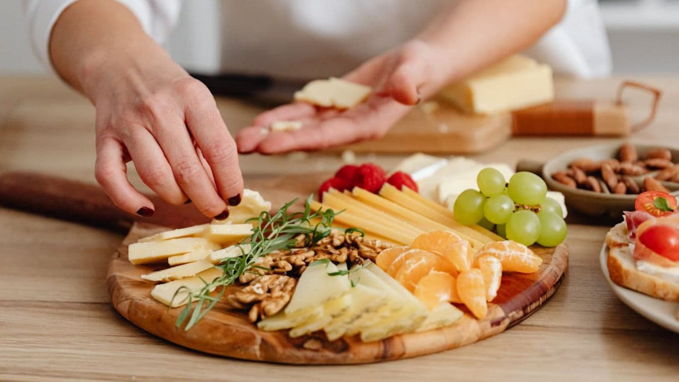 Charcuterie board getting prepared- banner image
