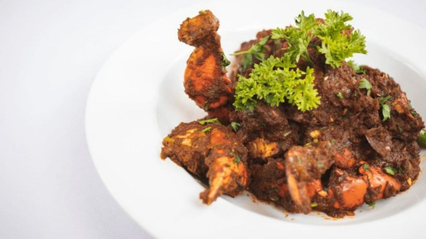 Spicy Crab Dish with Fresh Garnish