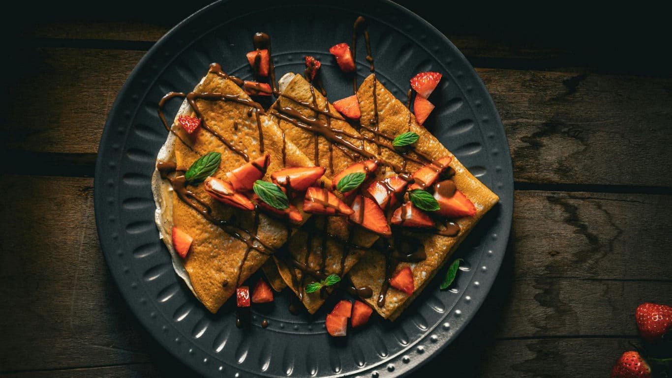 Chocolate Drizzled Crepes with Fresh Strawberries