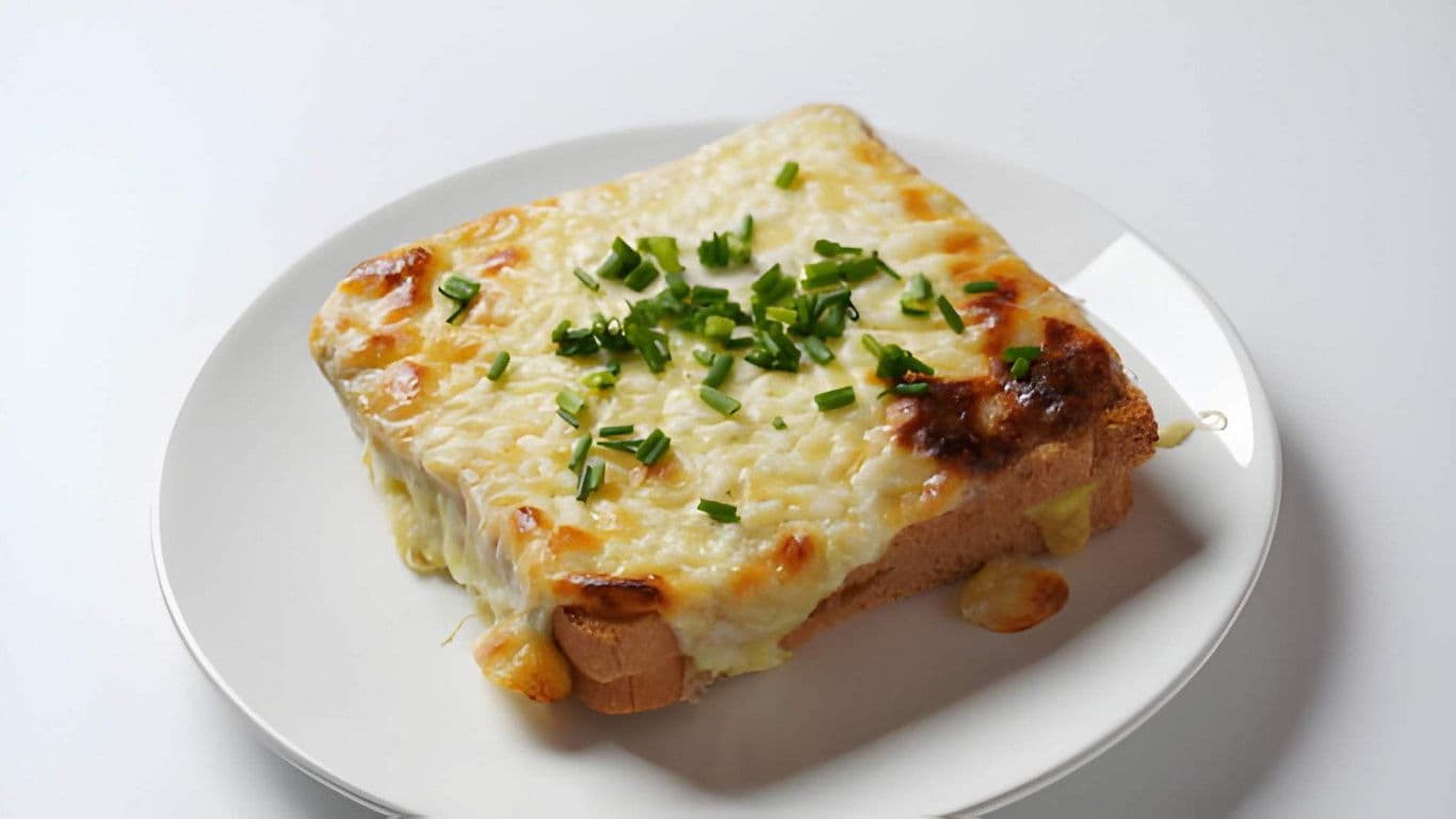 Cheesy Baked Toast with Chives on White Plate