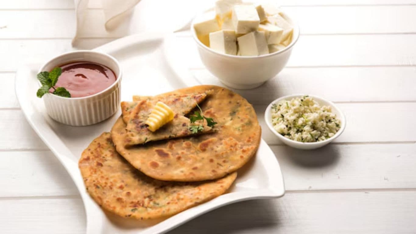 Stuffed parathas with butter and paneer